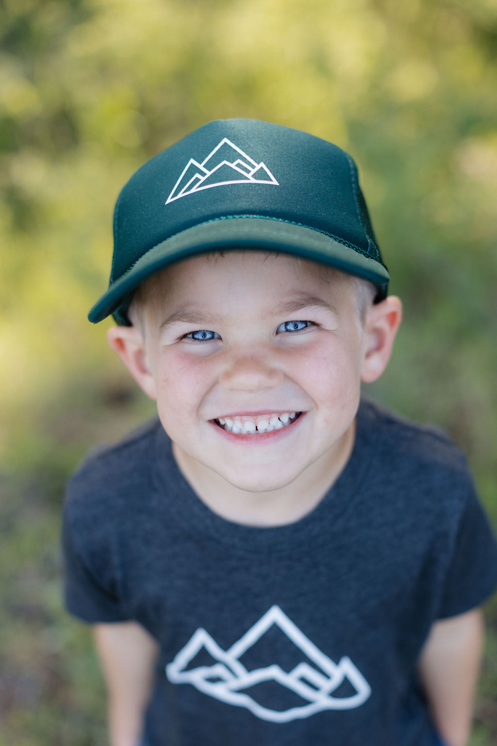 Kids Made of Mountains Logo Trucker Hat: Dark Green