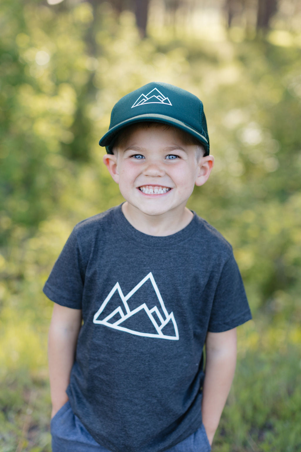 Kids Made of Mountains Logo Trucker Hat: Dark Green