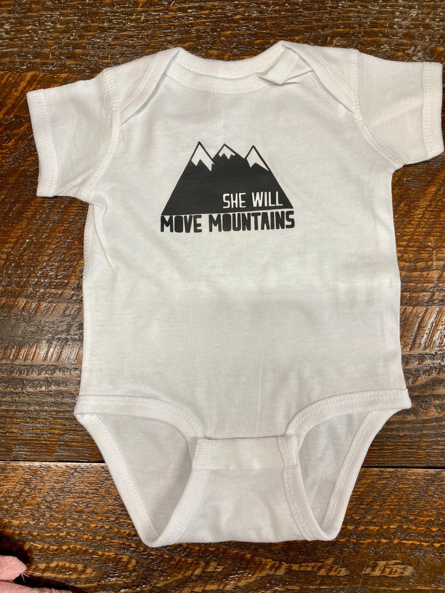She Will Move Mountains Onesie